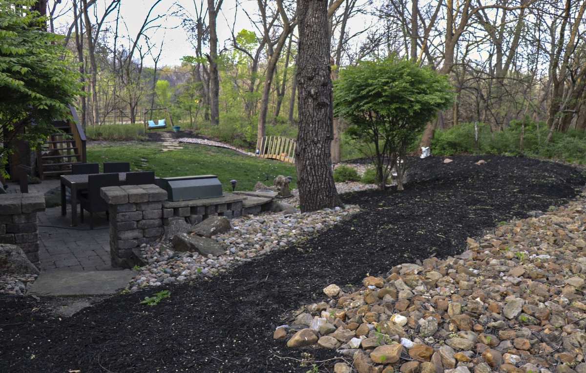 Fresh hardwood mulch installation in landscape beds